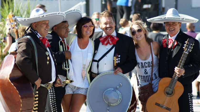 Fans Take Pictures With Mariachi's
