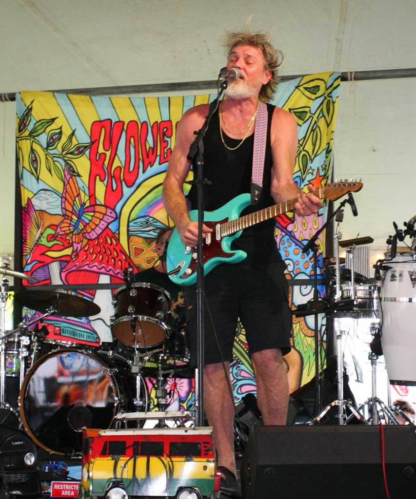 Lead singer of St. Pete Sons performing live on the festival stage.